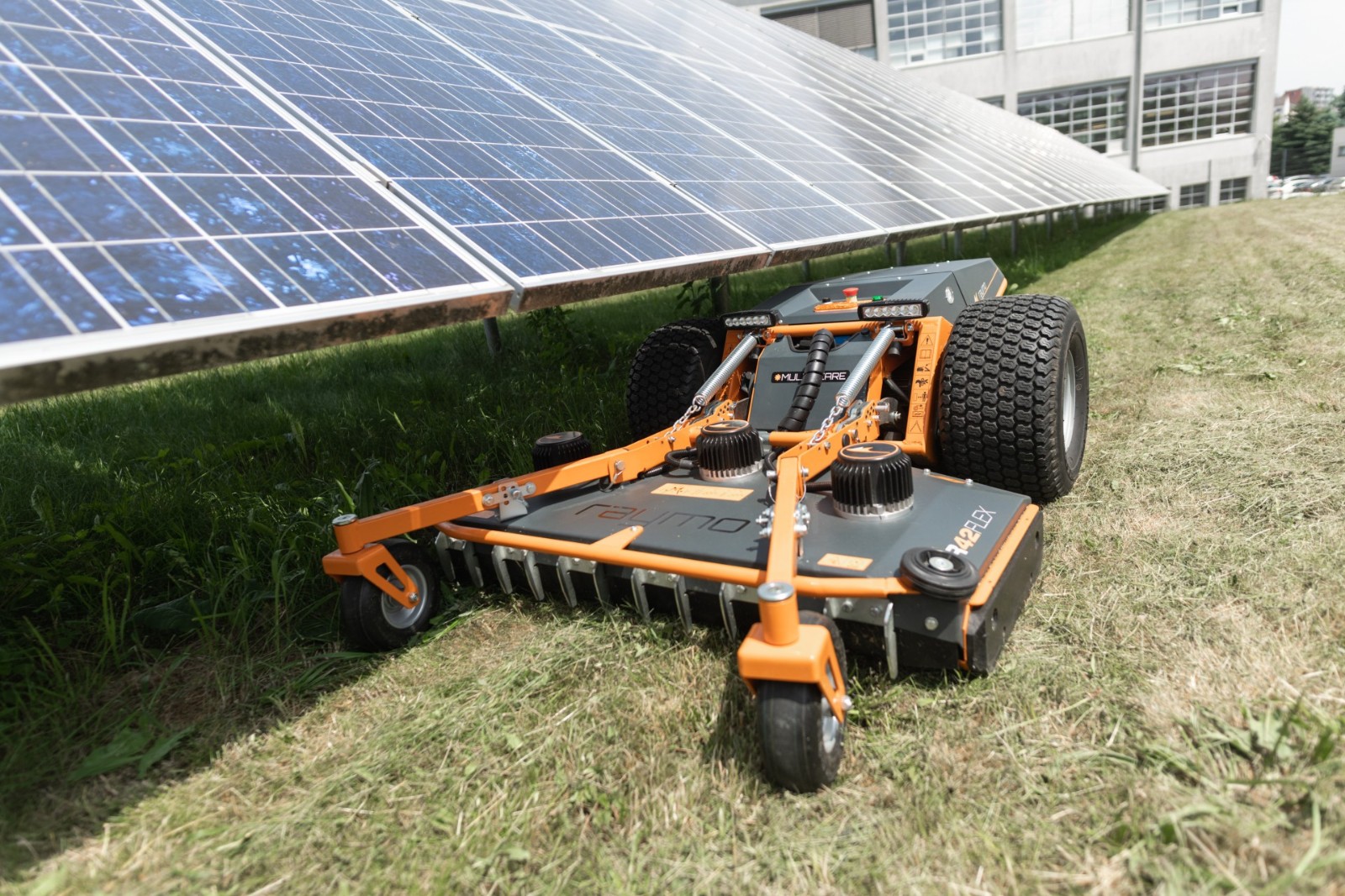 Raymo solar farm RAYMO with the R48CRAFT deck mowing under solar panels